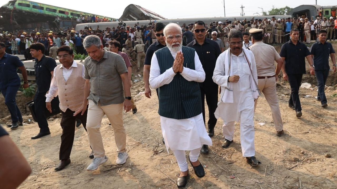 Indian Prime Minister Narendra Modi is seen visiting the crash site on Saturday.